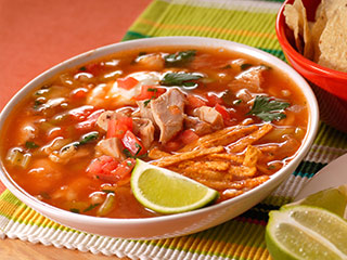 About as easy as it comes, this version of chicken tortilla soup utilizes pantry staples, canned goods, to create a close-to scratch made tasting soup that will satify your hungry crowd.